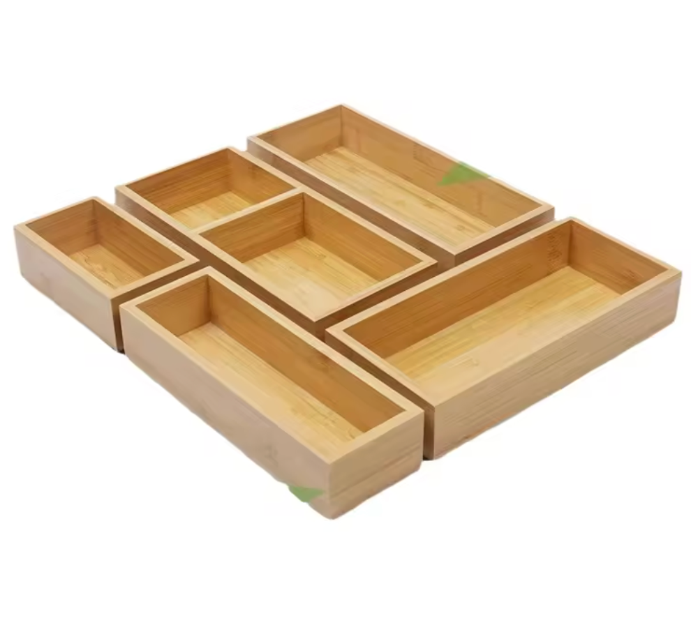 Set of wooden trays with compartments on a white background